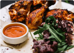 Side view of chicken kebab on lavash served……