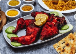 Side view of chicken kebab on lavash served……